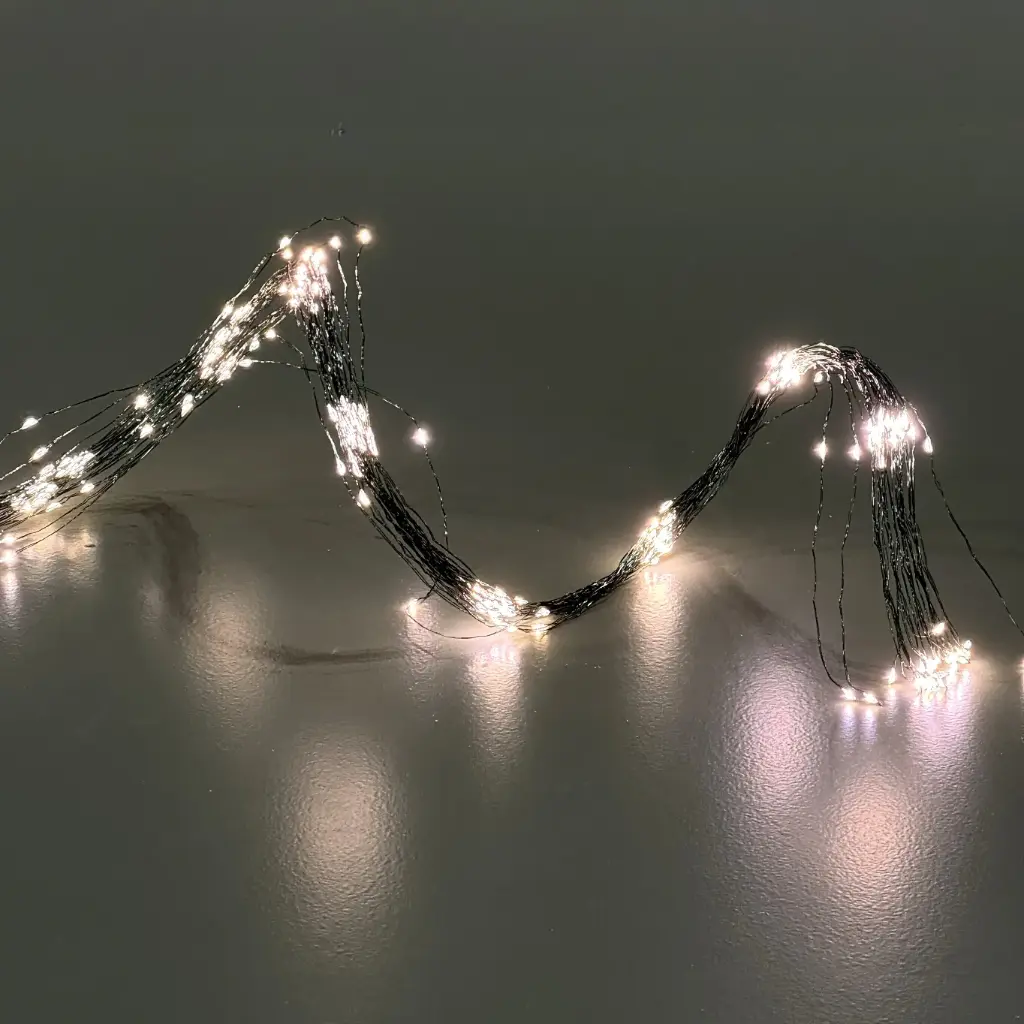 Multi strand light string, 64L warm white, green, battery, timer, 8 strands - 2.75'